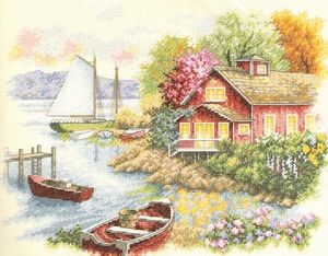 Huis met zeilboot aan het meer Huis met zeilboot aan het meer